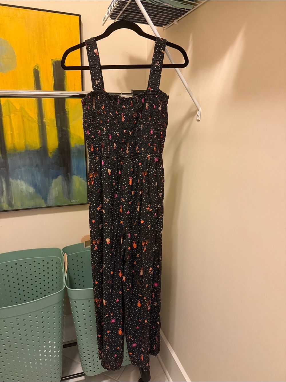 Black, orange and pink smocked jumpsuit